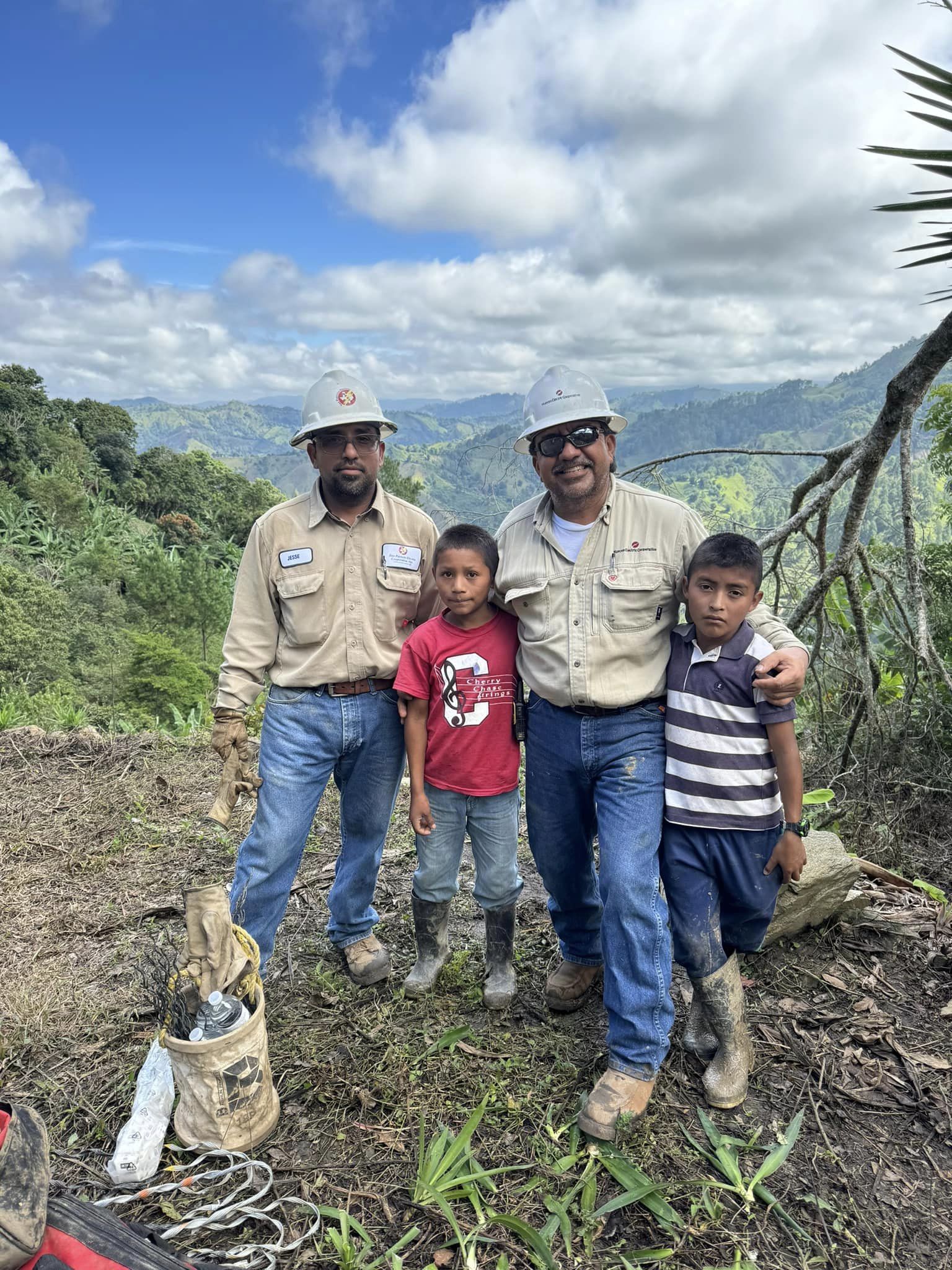 SPEC Linemen with Guatemalan Children